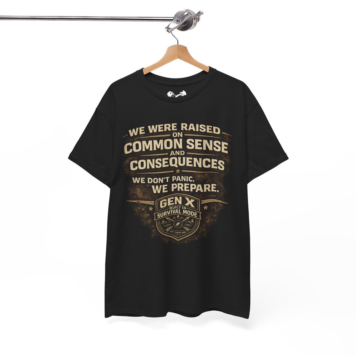 Black t-shirt with a logo on a hanger against a white background