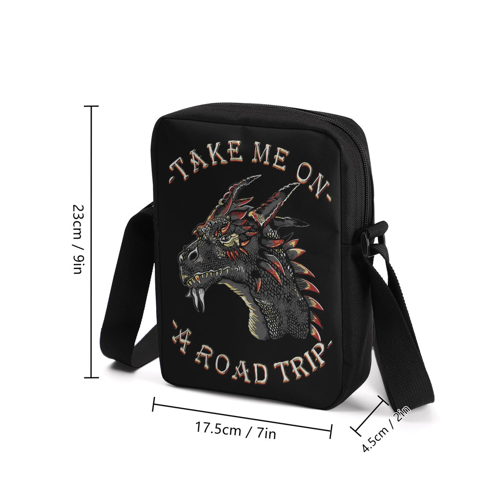 Take your style on the go with the Dragon Road Trip Cross-Body Bag, featuring bold dragon iconography and a spacious interior. This stylish bag has adjustable straps, so you can find your perfect fit effortlessly, while the secure zip-fastening will keep your items safe