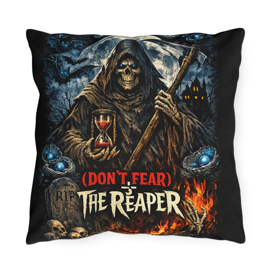 A square throw pillow with a black background featuring a detailed grim reaper graphic. The design shows a hooded skeleton holding an hourglass and an axe, with the text '(DON'T FEAR) THE REAPER' and 'R.