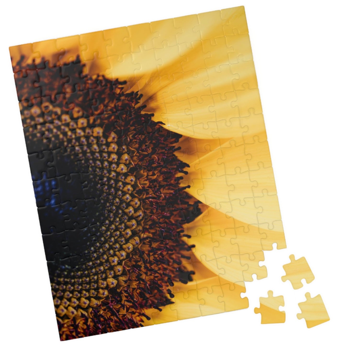 Unleash your inner puzzle solver with our Sunflower Close Up Puzzle! Piece together the vibrant colors and intricate details of this 110 to 1014 piece puzzle. Perfect for anyone who loves a challenge, this puzzle will provide hours of entertainment and a sense of accomplishment upon completion. Get yours today and experience the joy of solving!