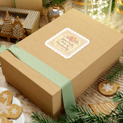 Wooden gift box with a decorative label on a festive table with cookies and greenery