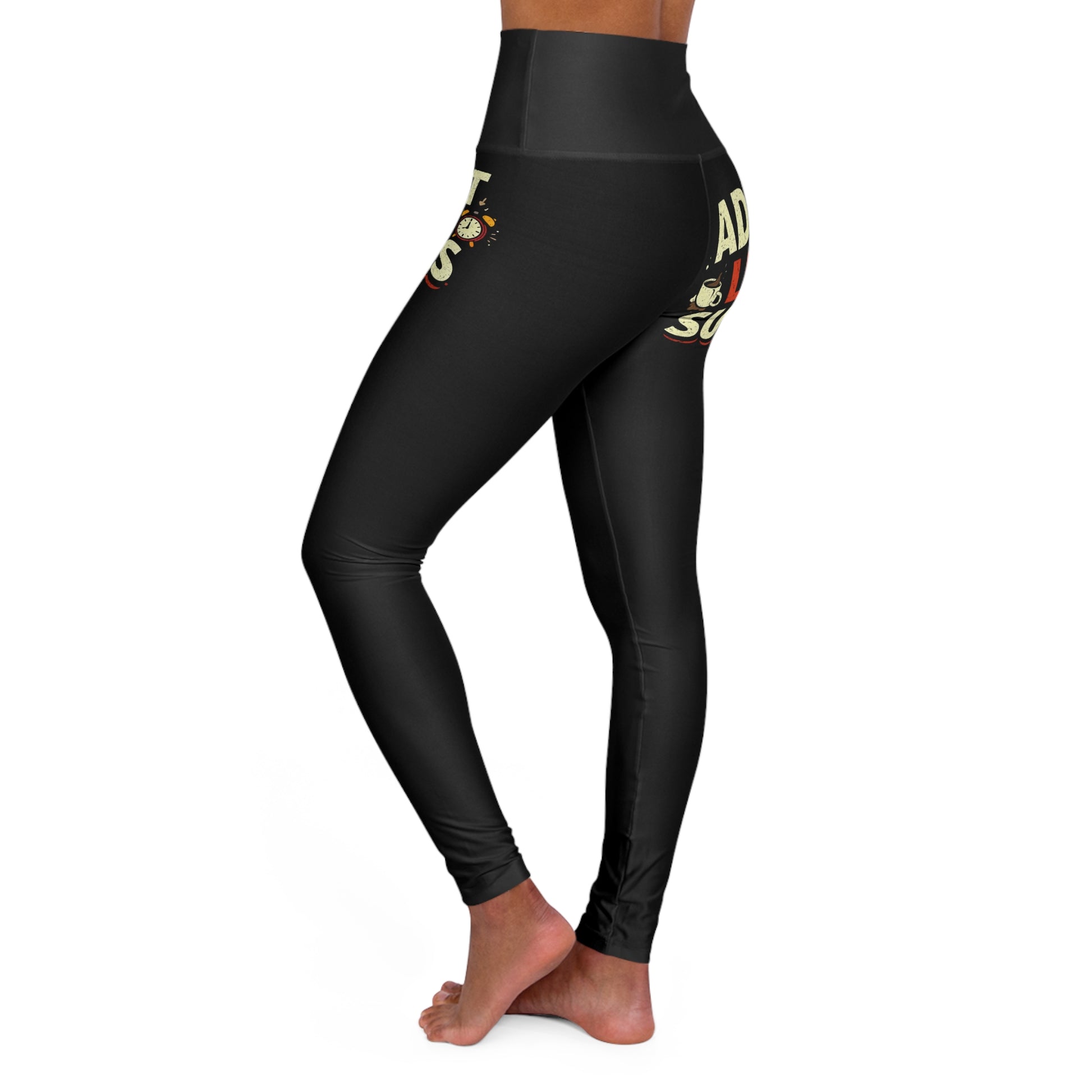 Black leggings with gold and red accents on a white background