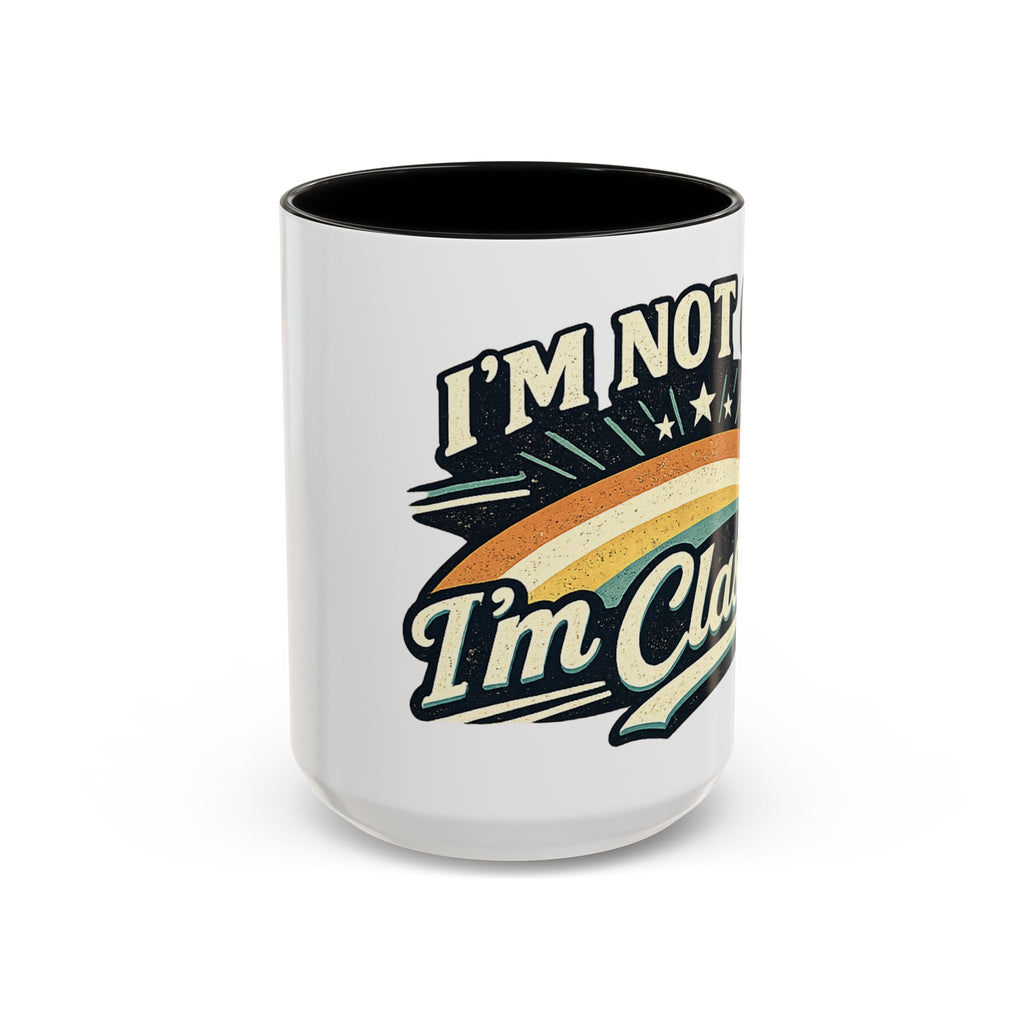 White mug with black interior, featuring a colorful graphic and text on a white background