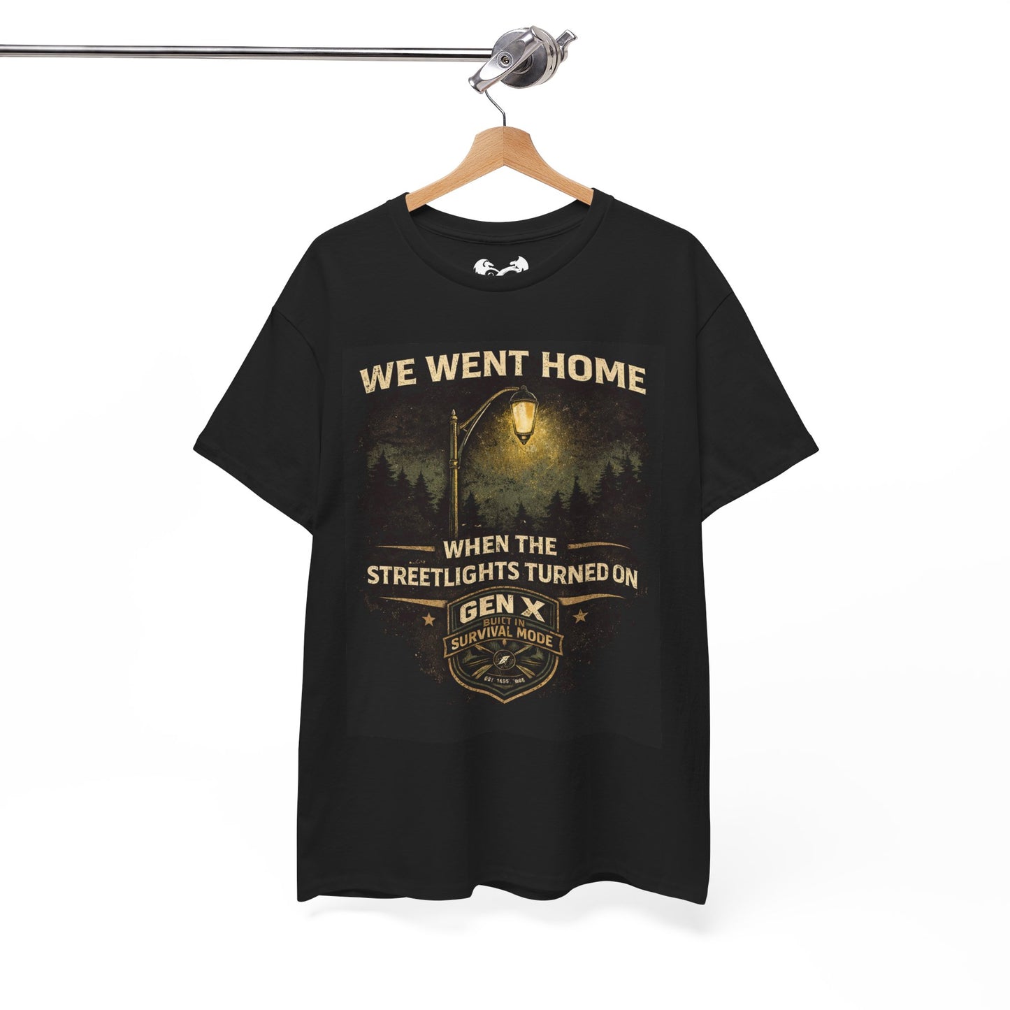 Black t-shirt with graphic design and text on a hanger against a white background