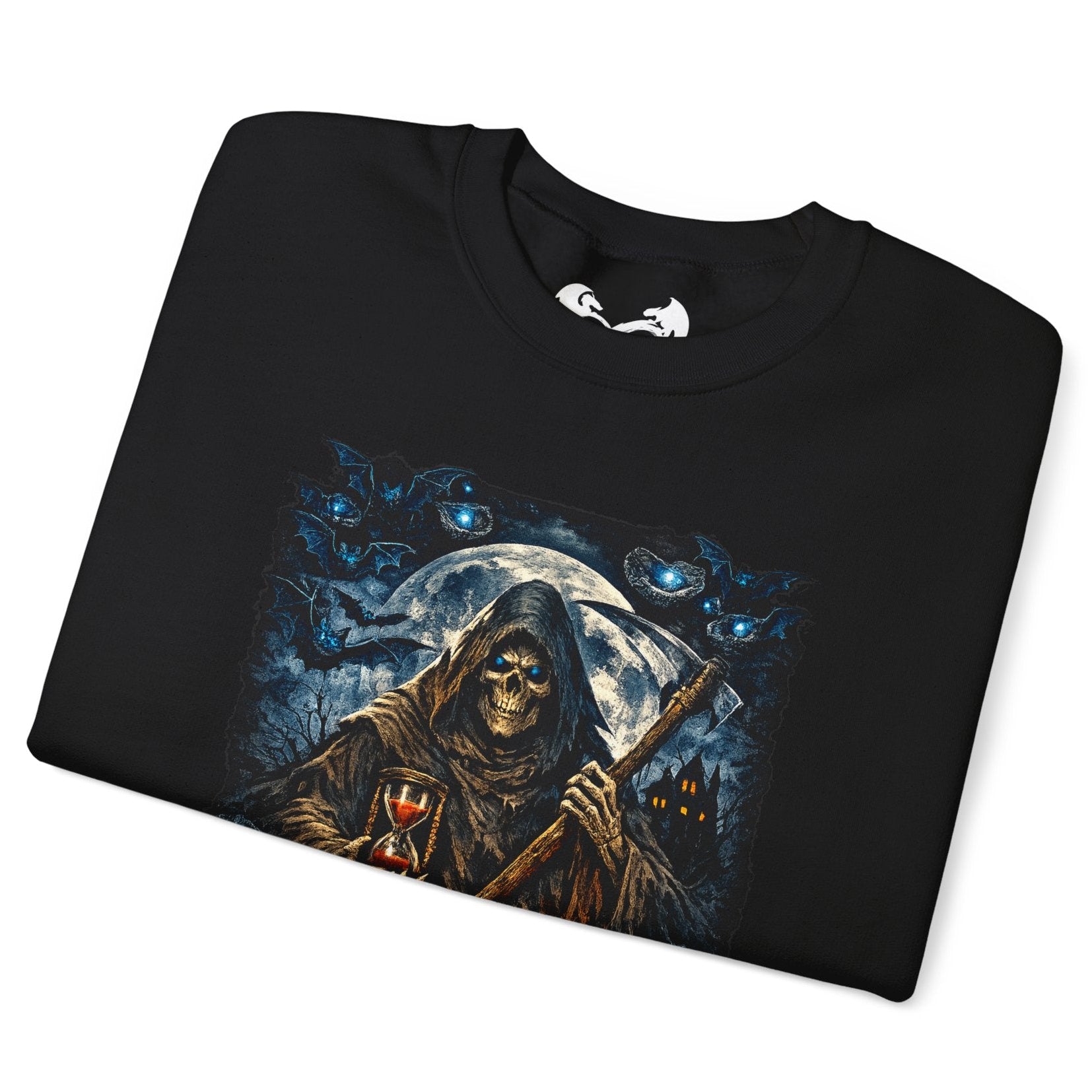 A black folded t-shirt with a detailed graphic print of a grim reaper holding a scythe in front of a full moon, surrounded by blue cats, shown on a plain white background.