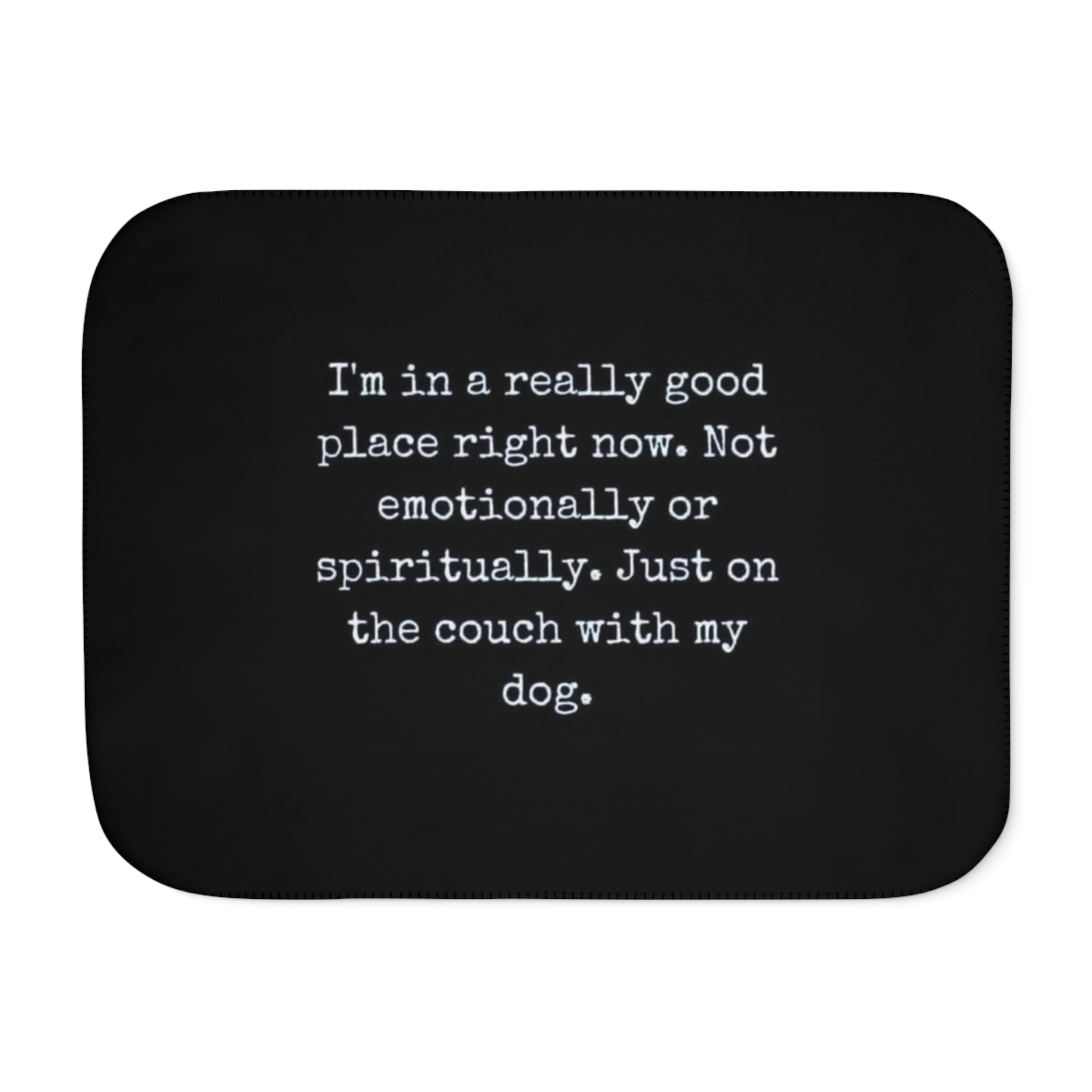 Black mat with white text on a white background