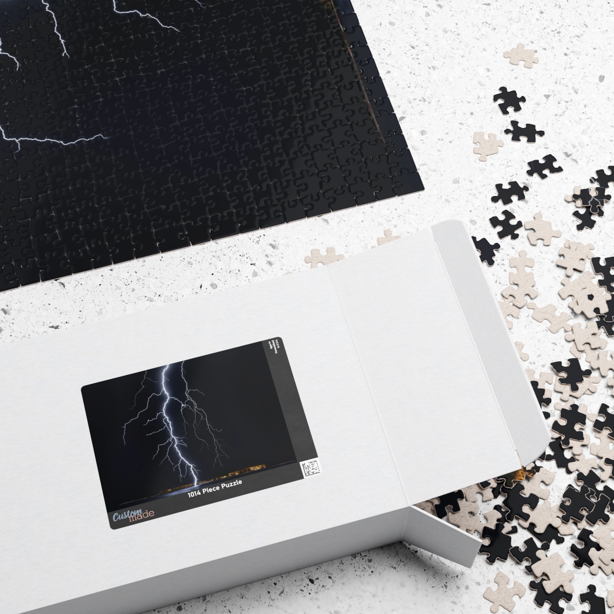 Experience the awe-inspiring beauty of nature with our Lightening Strikes Water Puzzle. This 110 to 1014 piece puzzle features a striking image of a lightning storm over a serene body of water. Challenge your mind and calm your soul with this captivating puzzle.
