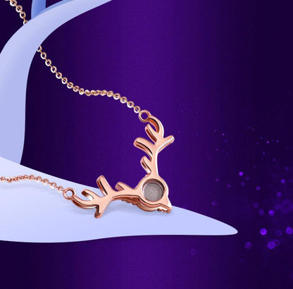 Elevate your holiday style with our Magical 100 "I Love You" Christmas Deer Necklace. Designed to enchant and delight, this necklace features a unique Christmas deer charm and a powerful reminder of love with our "I Love You" message hidden within the charms.