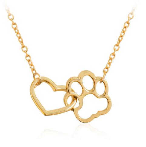 Capture the love and loyalty of your furry friend with our Heart Cat or Dog Footprint Necklace. This beautiful necklace features a heart pendant with a delicate paw print design, reminding you of the unconditional love and companionship of your pet. Show off your love with this unique accessory!