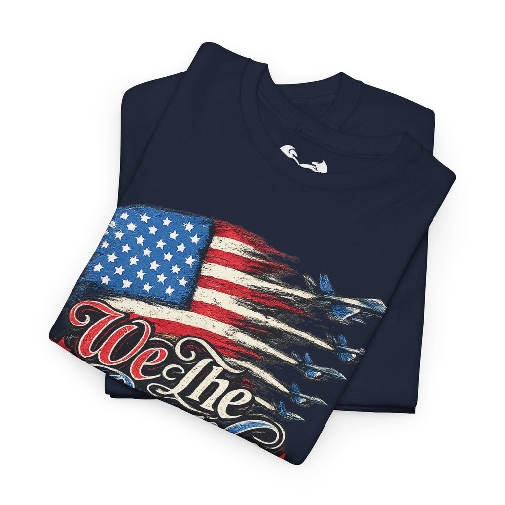 Folded navy blue t-shirt with American flag and 'We The' text on a white background