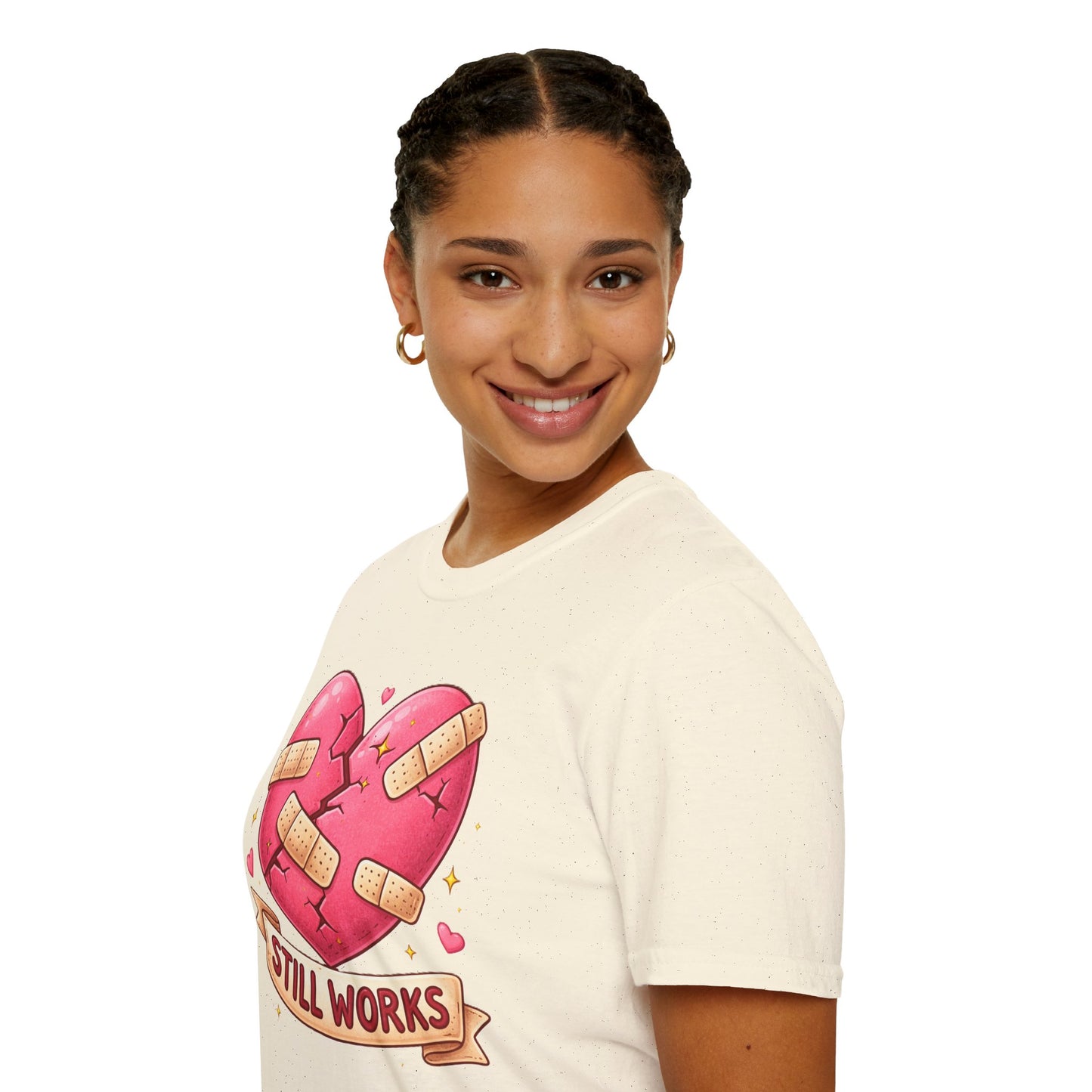 Person wearing a t-shirt with a heart design and text on a white background