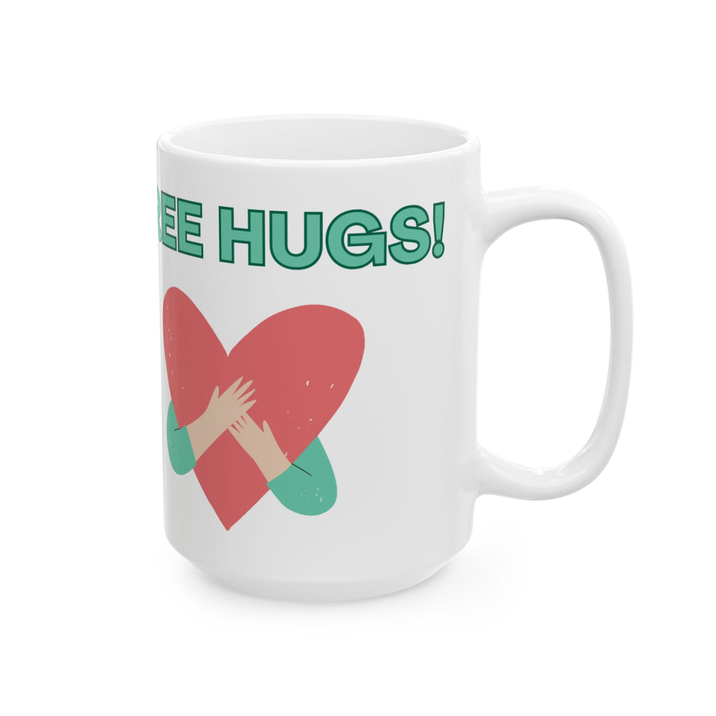 White mug with a red heart and hands hugging, and 'FREE HUGS!' text on a white background