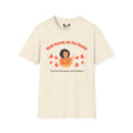 Beige t-shirt with graphic design and text on a white background
