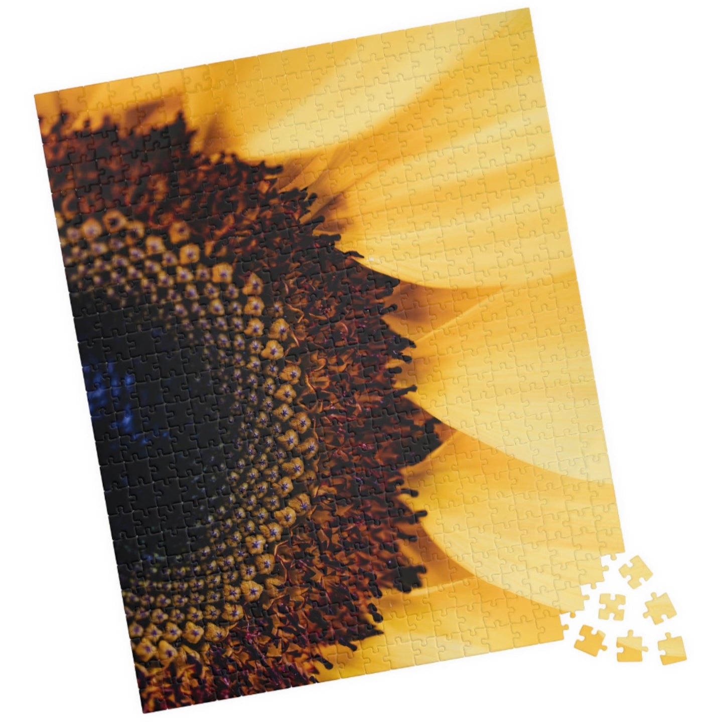 Unleash your inner puzzle solver with our Sunflower Close Up Puzzle! Piece together the vibrant colors and intricate details of this 110 to 1014 piece puzzle. Perfect for anyone who loves a challenge, this puzzle will provide hours of entertainment and a sense of accomplishment upon completion. Get yours today and experience the joy of solving!