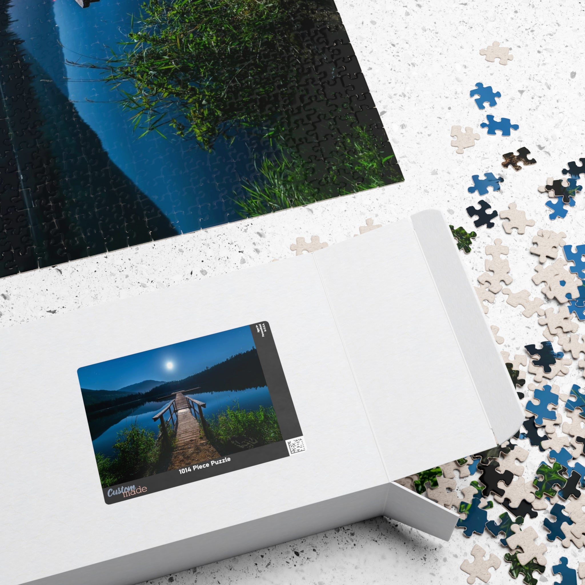 Experience the calming beauty of the Blue Moon At The Lake Puzzle. With 110 to 1014 pieces, this puzzle is perfect for all levels. Immerse yourself in the artistry of the blue moon reflecting on the serene lake, and feel the peace and tranquility it brings. A delightful challenge for any puzzle enthusiast.