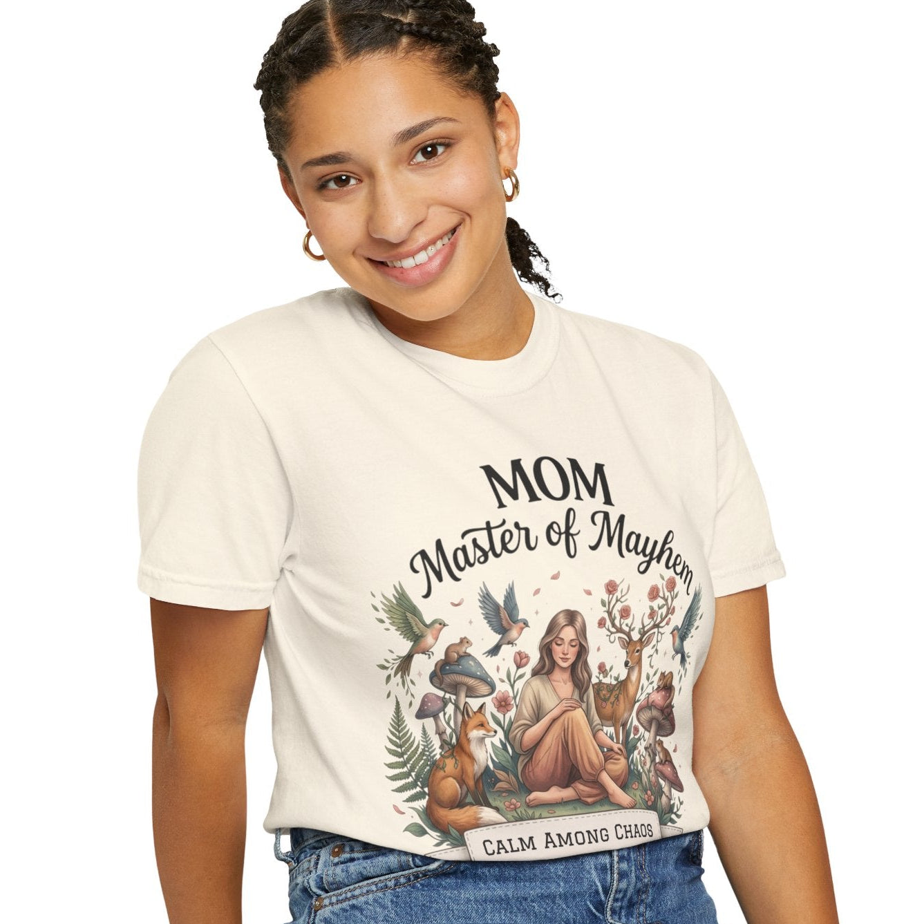 Woman wearing a t-shirt with 'Mom, Master of Mayhem, Calm Among Chaos' design on a white background