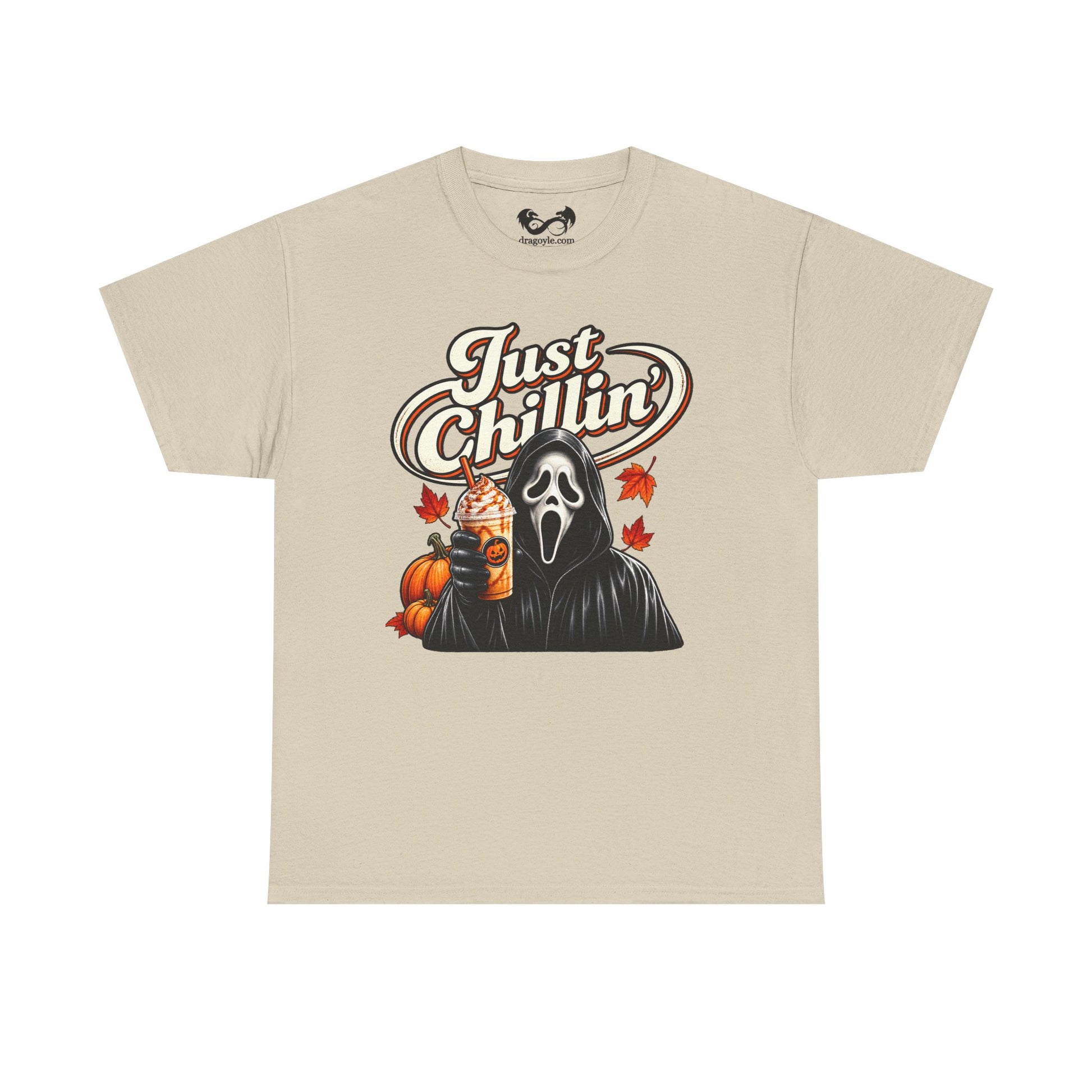 A beige crewneck t-shirt featuring a graphic print of Ghostface from Scream holding an iced coffee with whipped cream, next to a pumpkin and autumn leaves, with the text 'Just Chillin'' above.