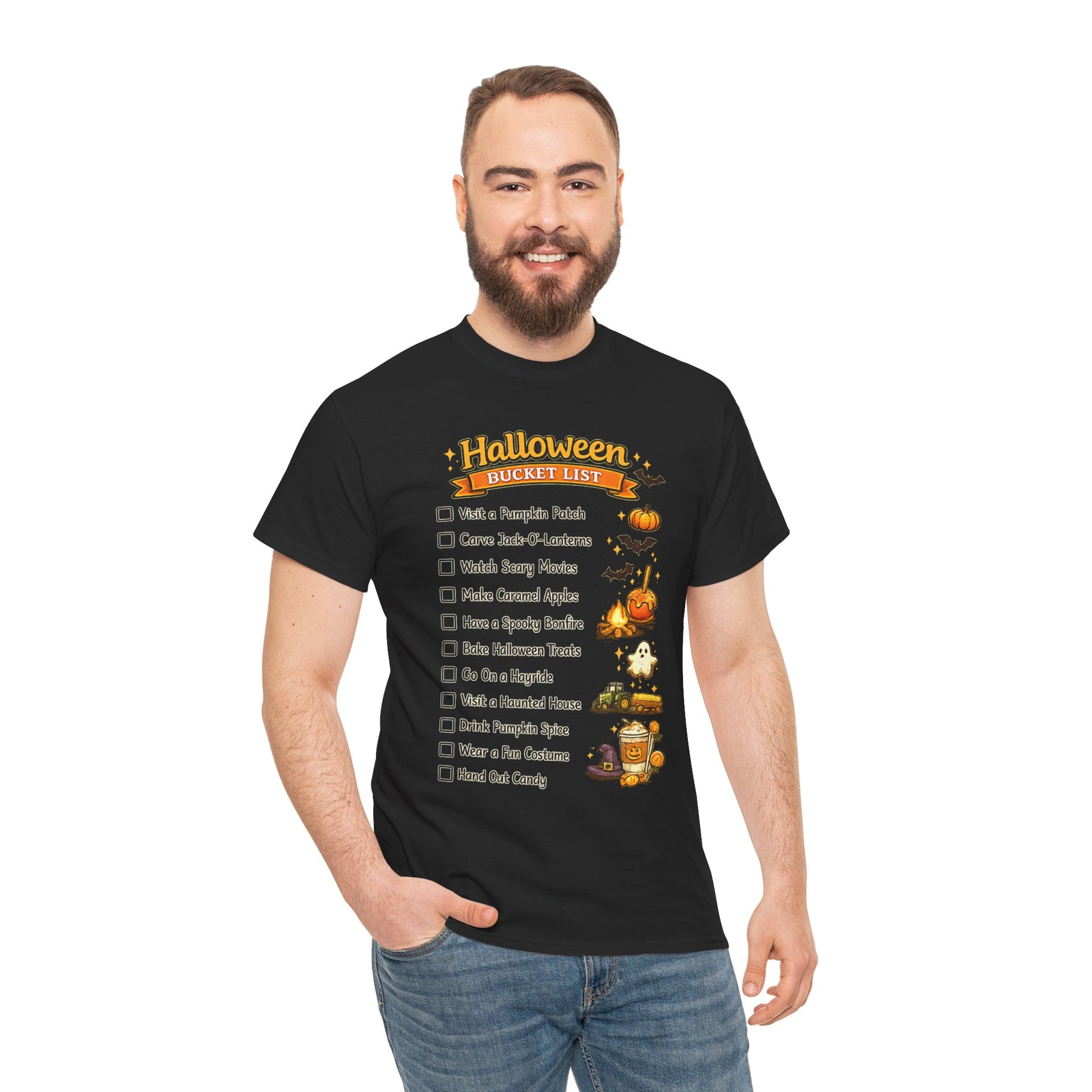 A man wearing a black graphic t-shirt with a 'Halloween Bucket List' checklist design, paired with blue jeans, against a plain white background.