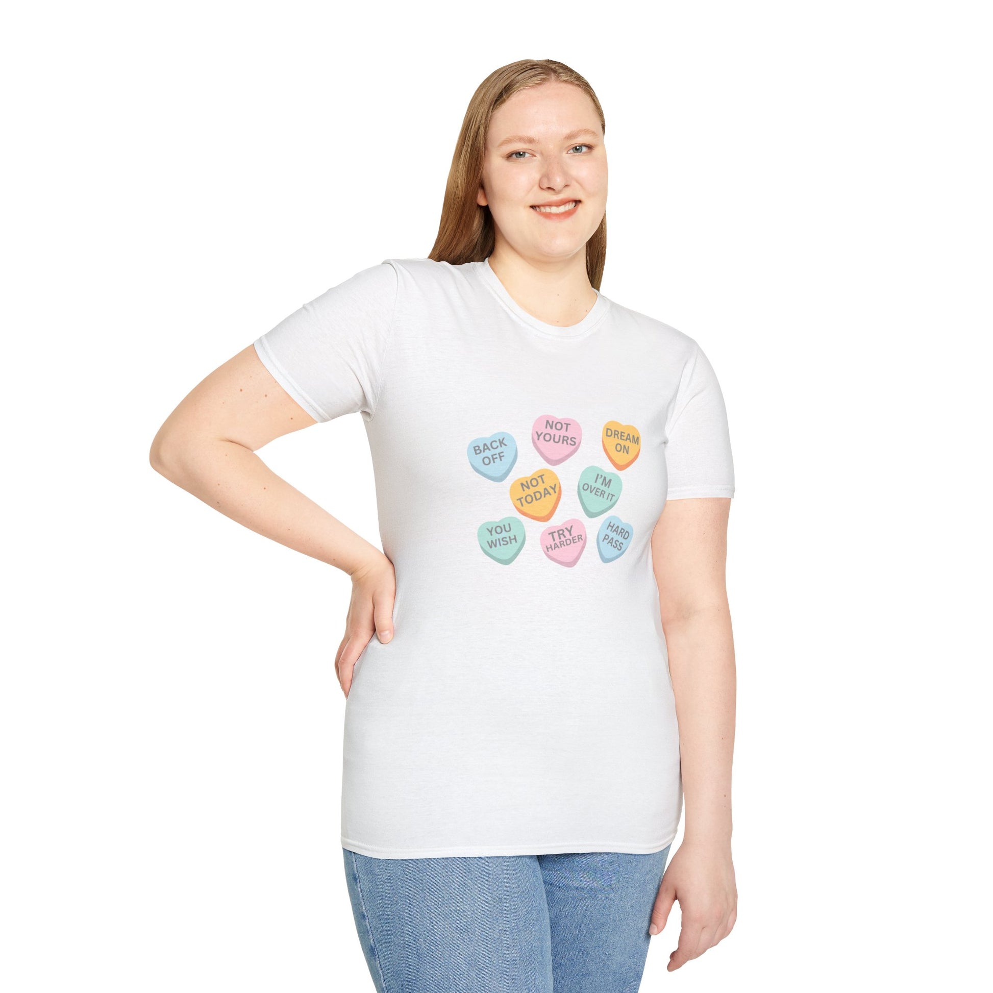 Person wearing a white t-shirt with colorful heart-shaped text design on a white background
