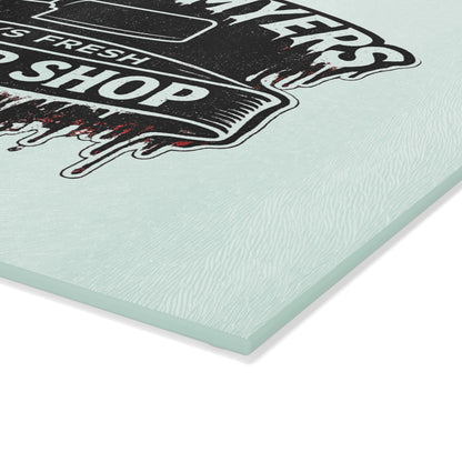 Bring a chilling touch of horror-inspired style to your kitchen with the Michael Myers Butcher Shop Glass Cutting Board. Designed for fans of classic slasher movies and spooky kitchen décor, this bold cutting board combines everyday functionality with a dark, Halloween-inspired aesthetic.