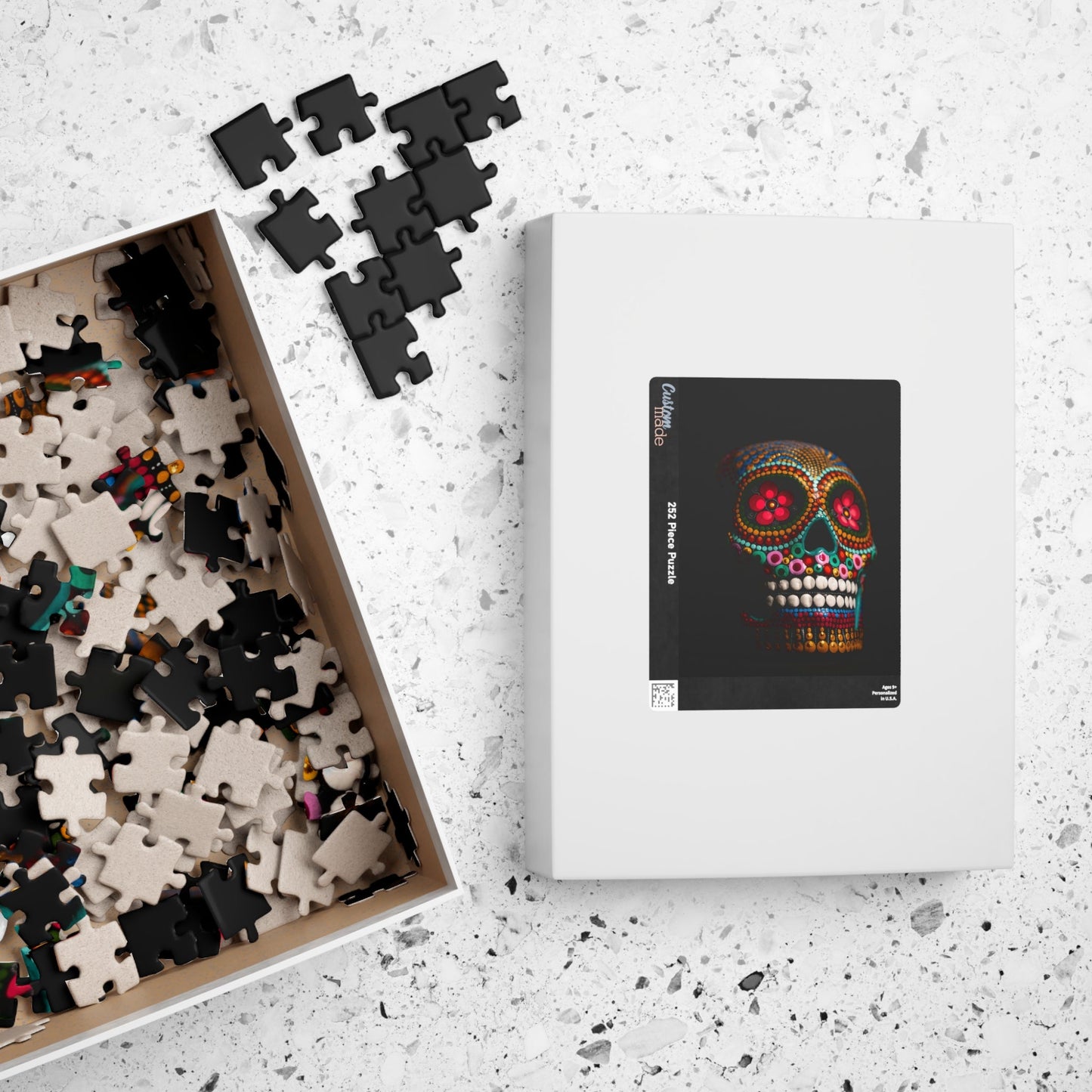 This colorful skull puzzle is perfect for puzzle lovers looking for a fun and challenging experience. With 110 to 520 pieces, it offers a range of difficulty levels for all skill levels. Get lost in the vibrant colors as you piece together this unique puzzle. Hang it up as a statement piece once you're done!