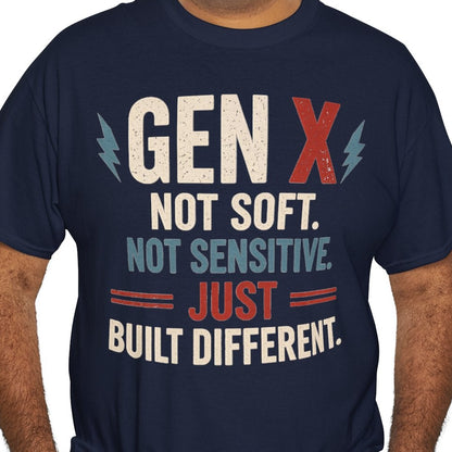 A man wearing a navy blue graphic t-shirt with the text 'GEN X NOT SOFT. NOT SENSITIVE.