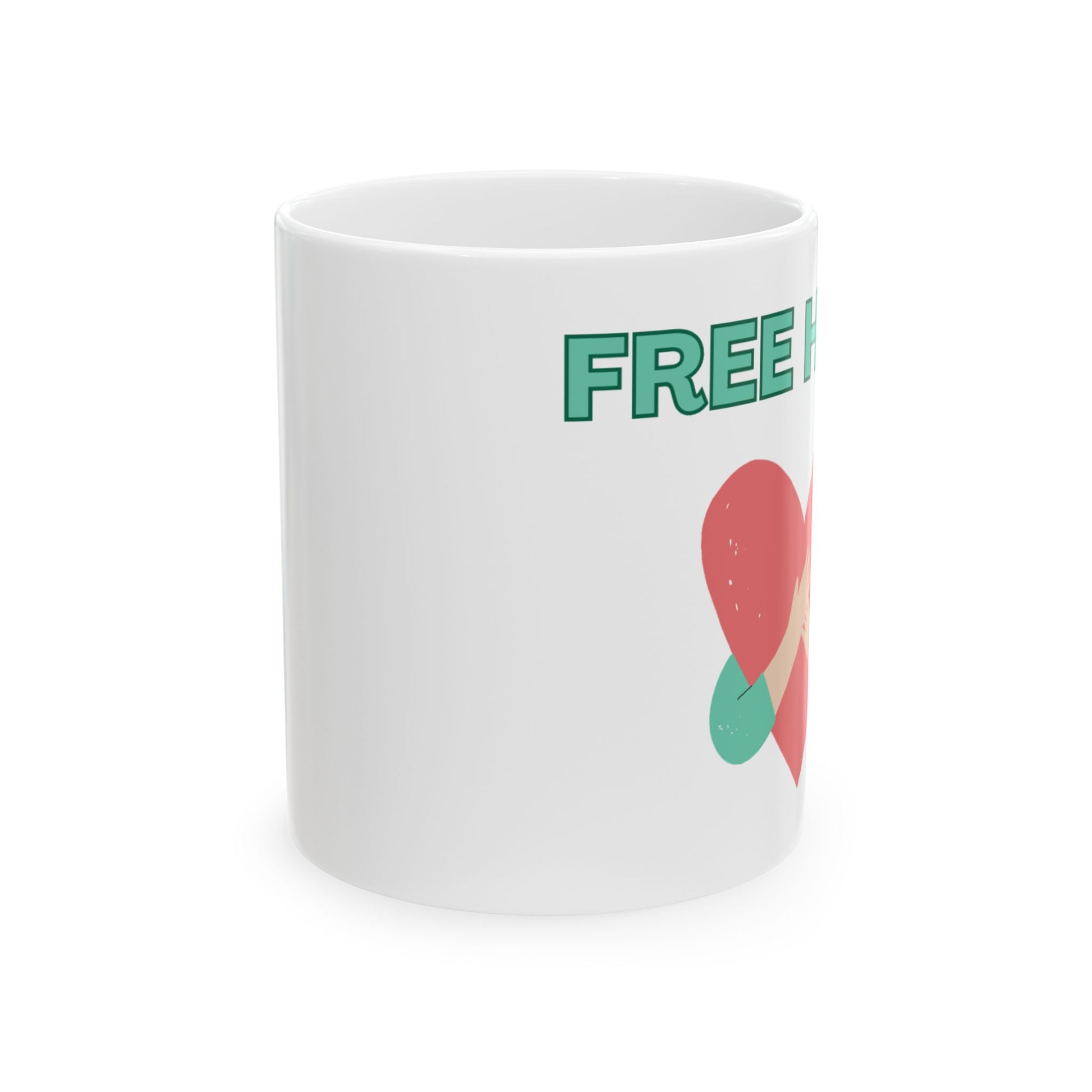 White mug with green text and red heart design on a white background