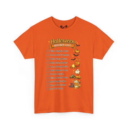 An orange crewneck t-shirt featuring a 'Halloween Bucket List' graphic print on the front, complete with a checklist of spooky activities and illustrations of pumpkins, ghosts, and bats.