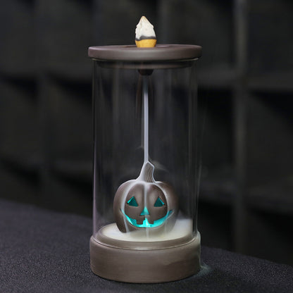 Elevate your Halloween ambiance with the Halloween Pumpkin Backflow Incense Burner. Crafted to create a mesmerizing smoke waterfall effect, it transforms your favorite incense cones into a captivating display.