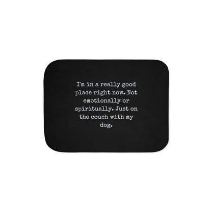 Black mouse pad with white text on a white background