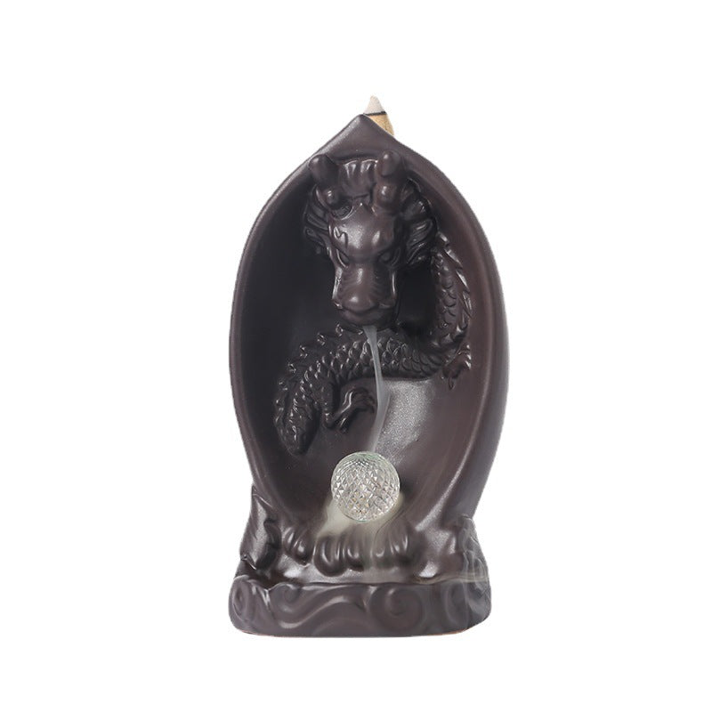 This Creative LED Lamp Backflow Dragon Incense Burner is a unique and eye-catching decoration for any space. Featuring a mesmerizing backflow smoke effect and LED lighting, this burner adds a touch of relaxation and ambiance to any room. 