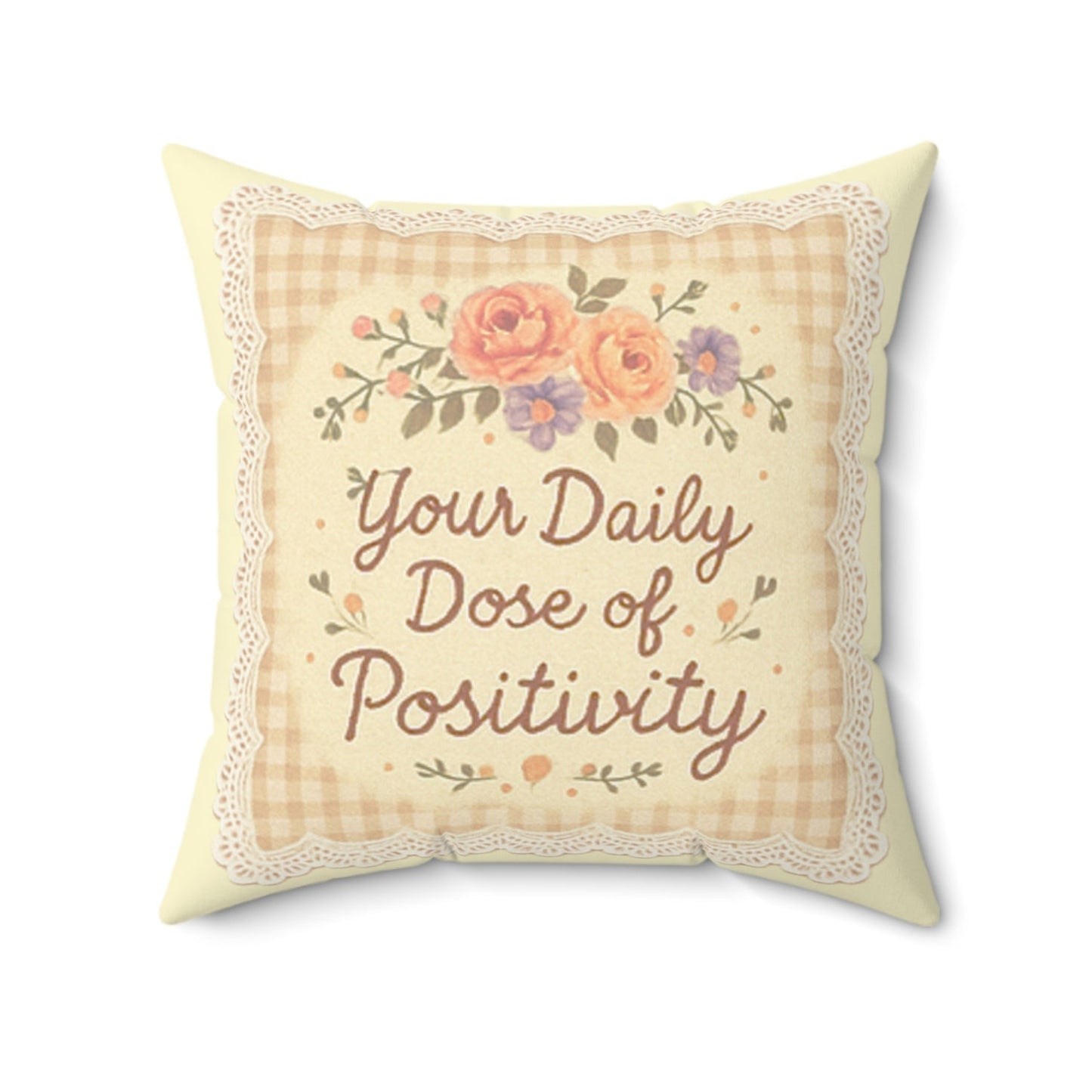Decorative pillow with floral design and text on a white background