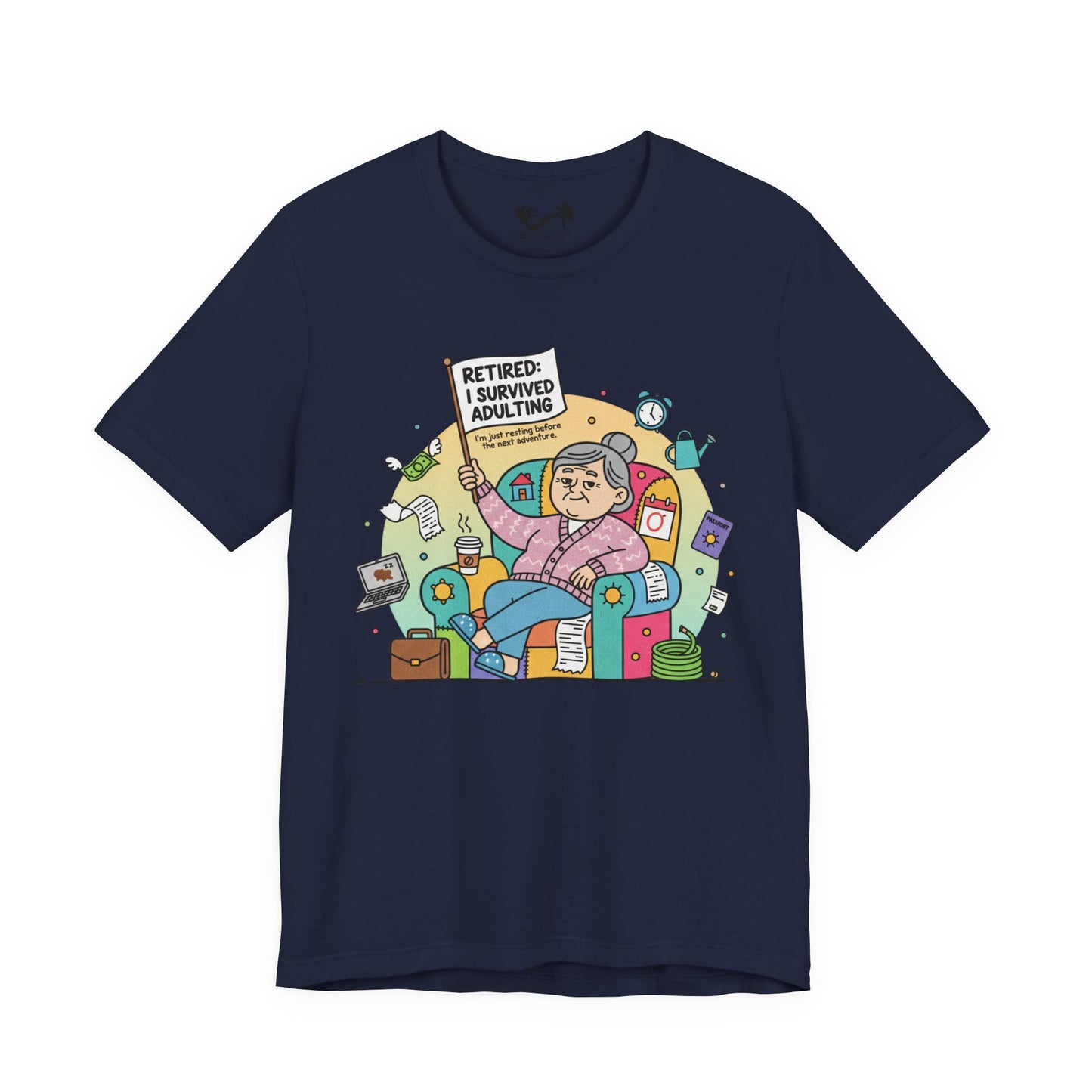 Navy blue t-shirt with a colorful graphic of a retired person holding a sign and sitting on a couch with various items around, on a white background.