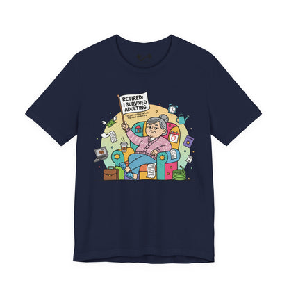 Navy blue t-shirt with a colorful graphic of a retired person holding a sign and sitting on a couch with various items around, on a white background.