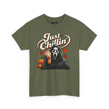 An olive green short-sleeve t-shirt with a graphic print of the Ghostface character holding an iced coffee, next to pumpkins and autumn leaves, with the text 'Just Chillin'' above.