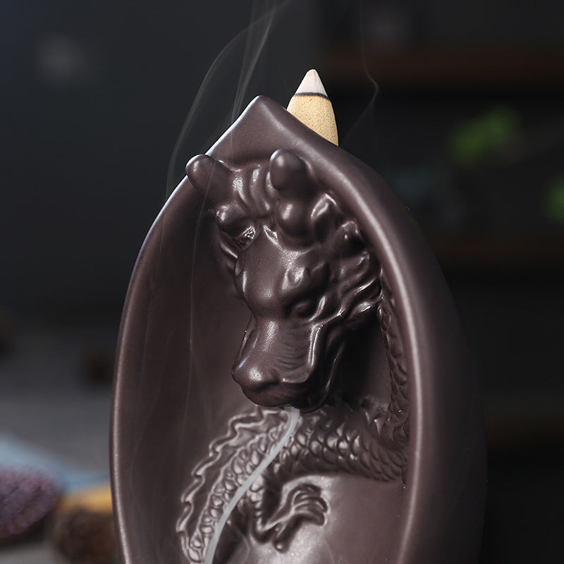 This Creative LED Lamp Backflow Dragon Incense Burner is a unique and eye-catching decoration for any space. Featuring a mesmerizing backflow smoke effect and LED lighting, this burner adds a touch of relaxation and ambiance to any room. 