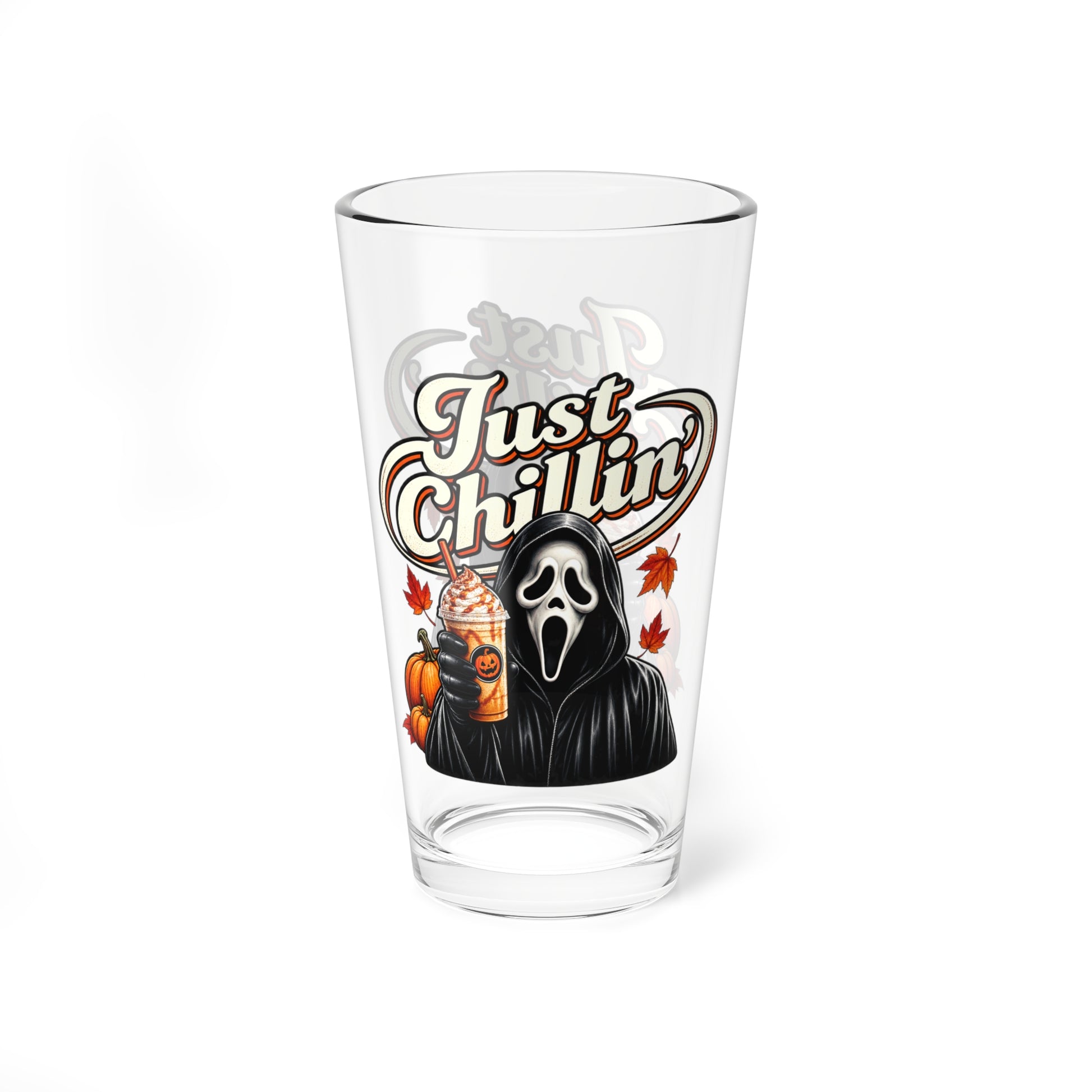 A clear pint glass featuring a Halloween-themed graphic of Ghostface holding an iced coffee with a pumpkin, under the text 'Just Chillin'', on a white background.