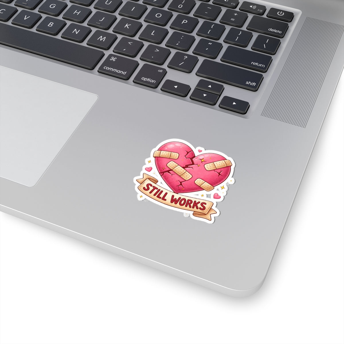 My Broken Heart Still Works Kiss-Cut Sticker Celebrate resilience with this beautiful kiss-cut sticker.