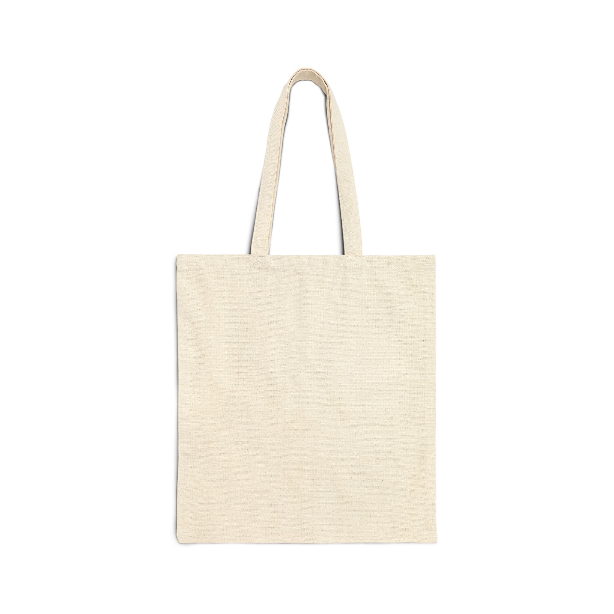 Durable heavy cotton construction and reinforced handles make it practical for everyday use while the modest printed design keeps the vibe polished and playful.