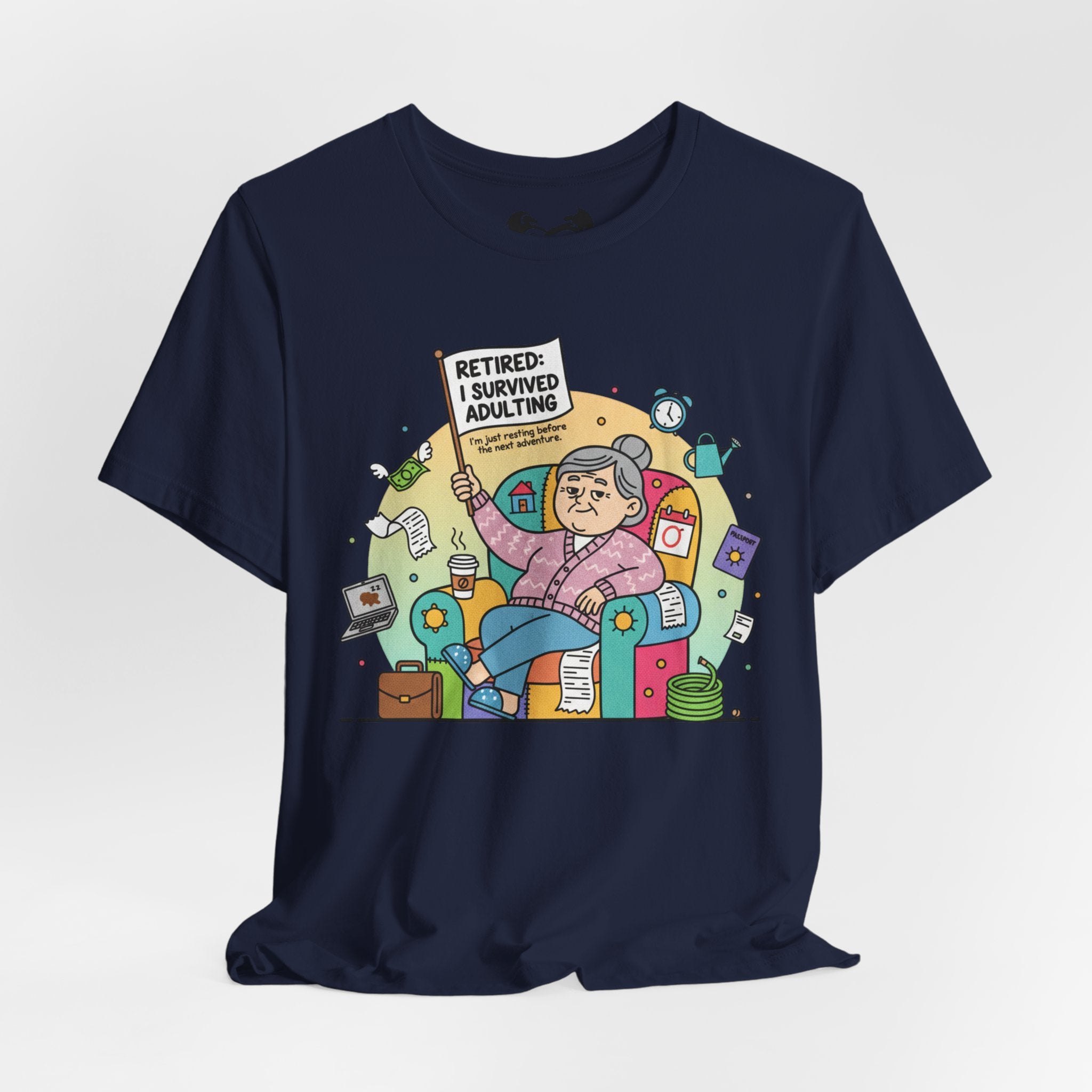 Black t-shirt with a colorful graphic of an elderly woman holding a 'Retired: I Survived Adulting' sign on a white background.