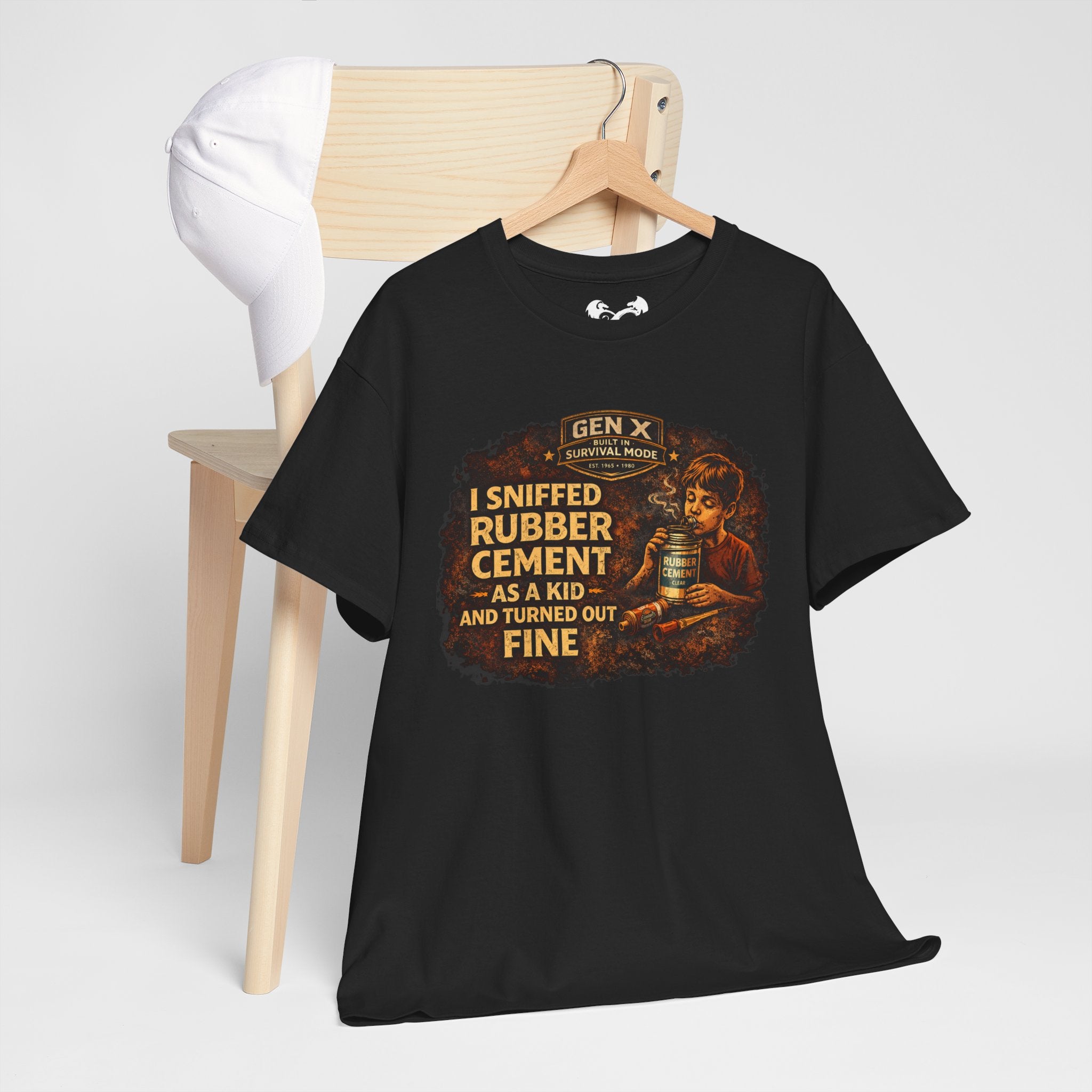 Black t-shirt with colorful graphic and text on a wooden hanger against a white background