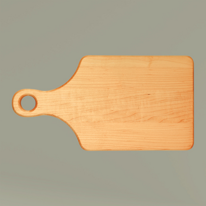 Wooden cutting board with a handle on a gray background