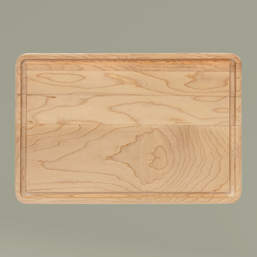 Wooden cutting board on a gray background