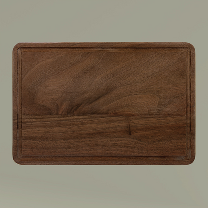 Wooden cutting board on a beige background