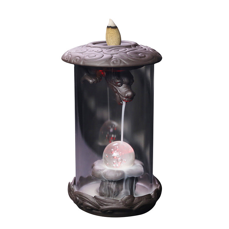 Upgrade your incense game with our Purple Sand Dragon Backflow Incense Burner. This beautiful burner features a unique design that releases a downward flow of smoke, creating a mesmerizing and relaxing ambiance. Perfect for meditation, yoga, or simply unwinding after a long day.