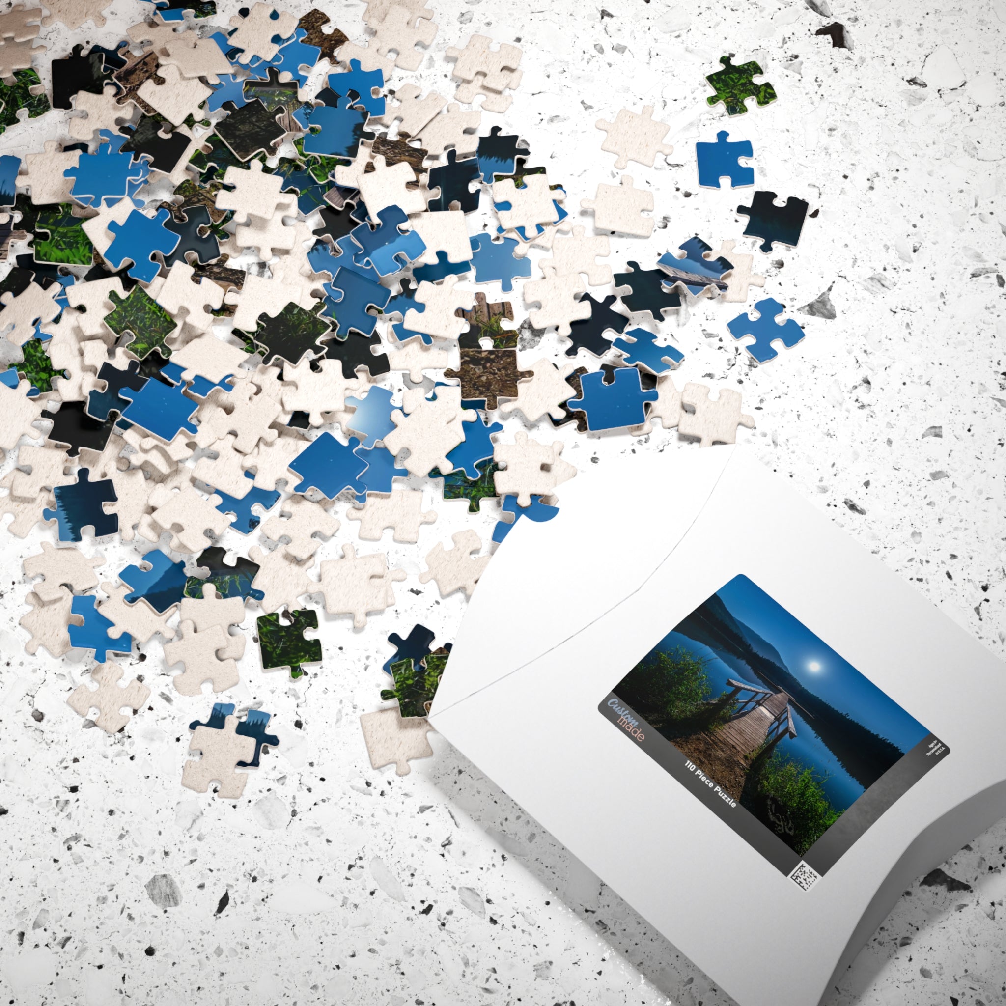 Experience the calming beauty of the Blue Moon At The Lake Puzzle. With 110 to 1014 pieces, this puzzle is perfect for all levels. Immerse yourself in the artistry of the blue moon reflecting on the serene lake, and feel the peace and tranquility it brings. A delightful challenge for any puzzle enthusiast.