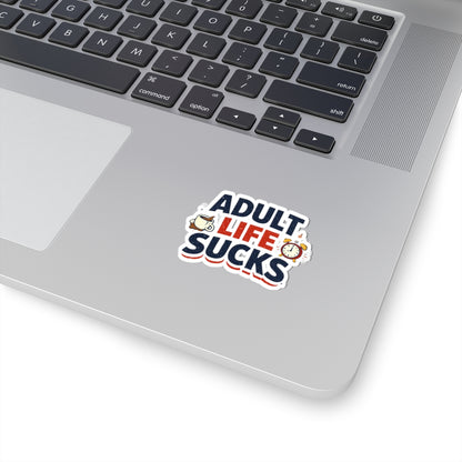 Laptop with a 'Adult Life Sucks' sticker on the palm rest area