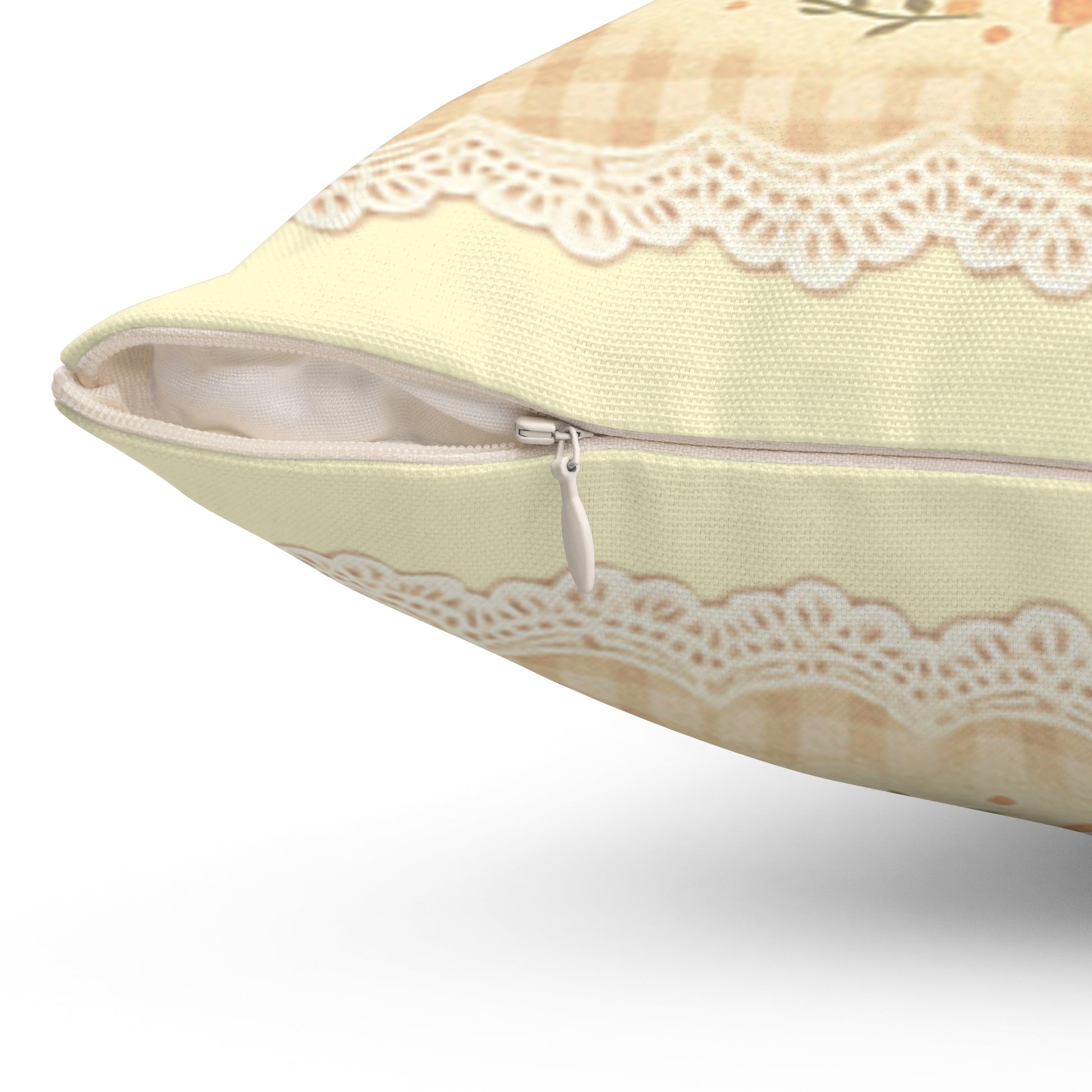 Light green pillow with lace trim on a white background