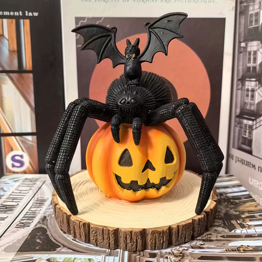 Bring a daring touch to your Halloween décor with this striking resin decoration featuring a menacing spider poised on a vibrant pumpkin.