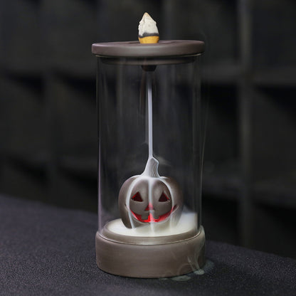 Elevate your Halloween ambiance with the Halloween Pumpkin Backflow Incense Burner. Crafted to create a mesmerizing smoke waterfall effect, it transforms your favorite incense cones into a captivating display.